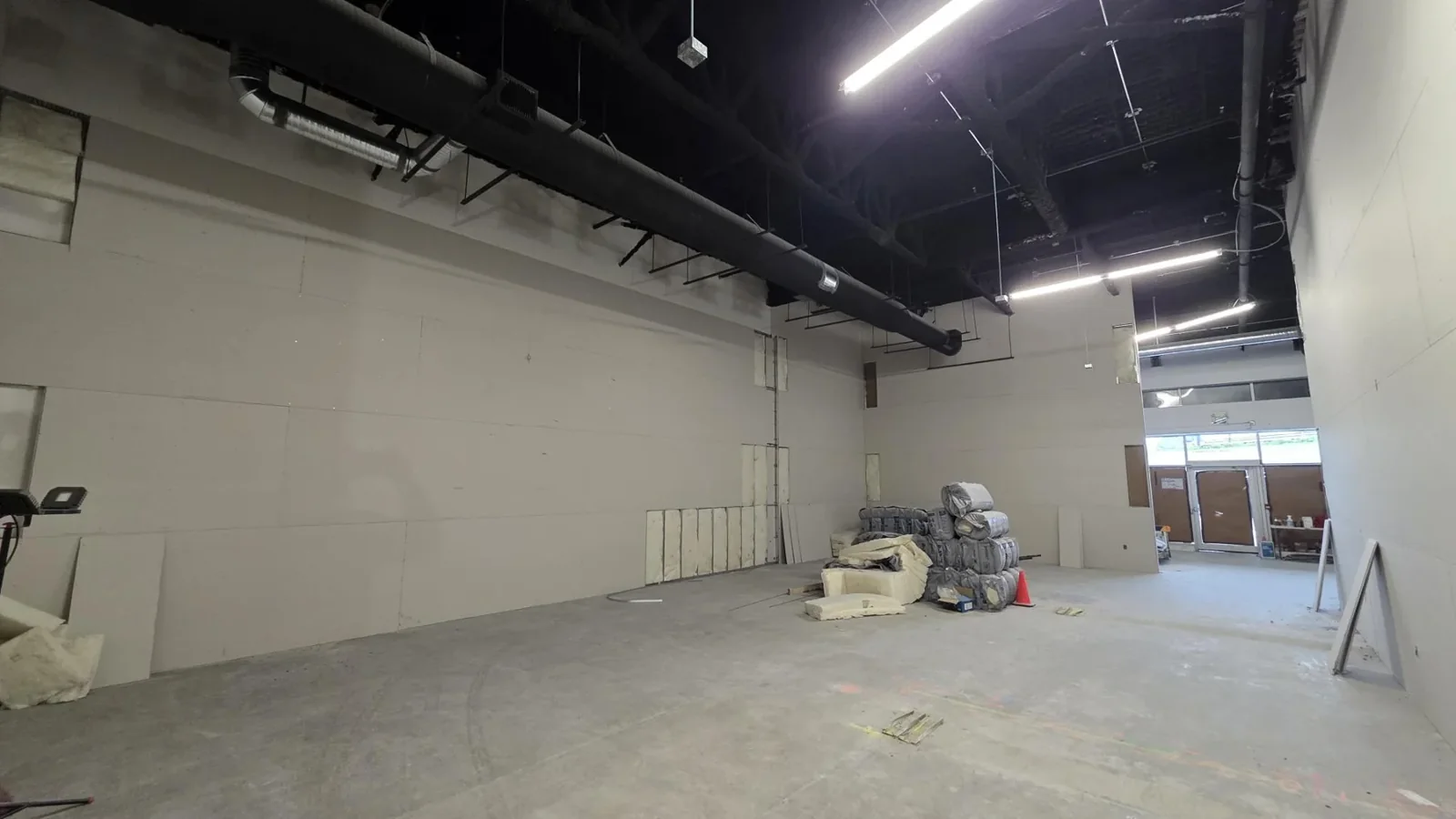 Boarded retail partitions at Club Champion, Surrey